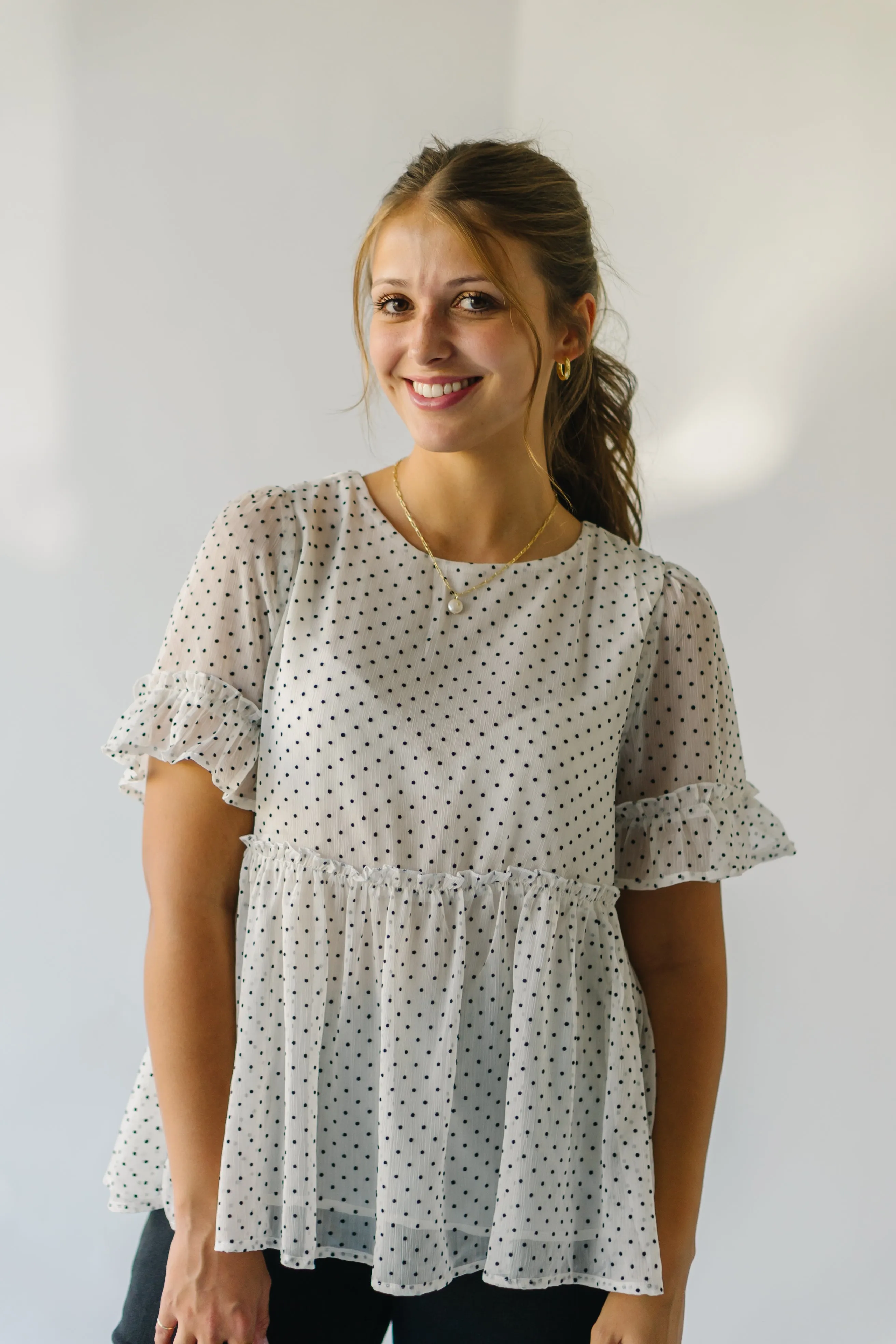 The Duran Polka Dot Peplum in Ivory